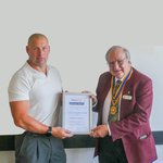 Clifton awards lifeguard for dedicated service.